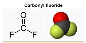 What is the angle between the carbon-oxygen bond and one of the carbon-fluorine bonds in the carbony