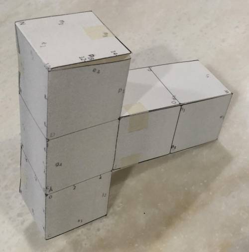 What is the surface area of the above composite object made out of two rectangular prisms?  700 mm^2