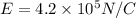 E = 4.2 \times 10^5 N/C