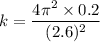 k=\dfrac{4\pi^2\times 0.2}{(2.6)^2}