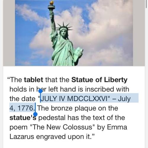 What does the tablet of the statue of liberty say