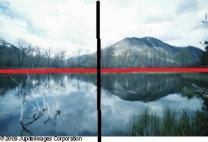 Describe where the line of reflection is in this picture.