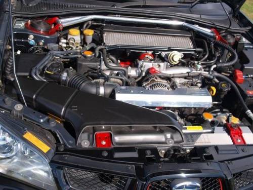 A car's cooling system has a capacity of 20 quarts. Initially, the system contains a mixture of 3 qu