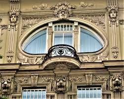 Which artists is not associated with art nouveau architecture?