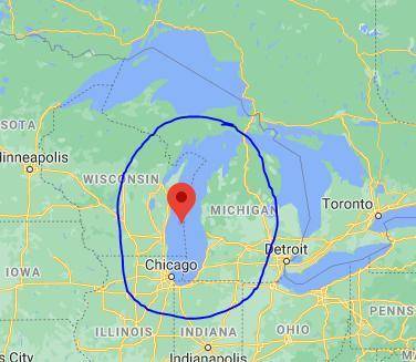 Which of the Great Lakes does not form a natural barrier between the United States and Canada?