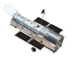 What question did use of a telescope by hubble answer A) Is earth the center of the universe B) Is t