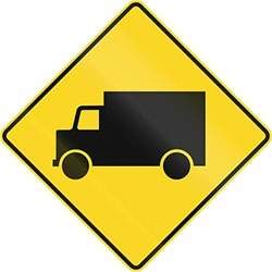 What does this picture mean?  be aware of large trucks on the roadway use truck ru