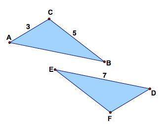 Two triangles are shown to be congruent by identifying a combination of translations, rotations, or