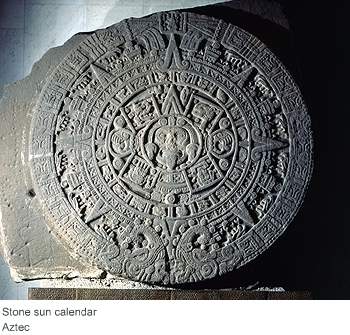Which sentence describes this aztec stone calendar? a: the glyphs on it tell the