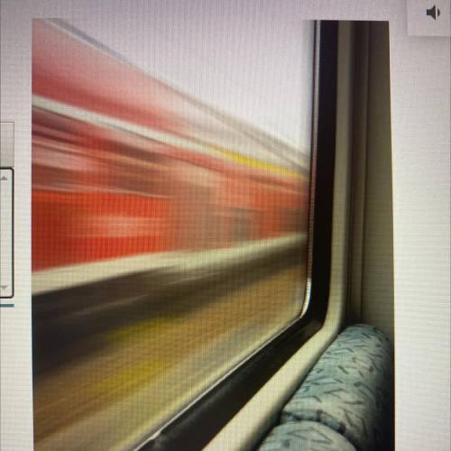 Imagine you are sitting on a train. Using the photo on

the right for visual clues, describe the p