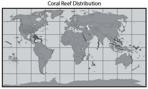 The dark areas on the map show the distribution of coral reefs around the world. What explanation b