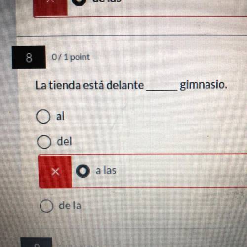 La tienda está delante _____
gimnasio.