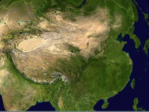 Look at the satellite image of China and describe what landscapes and geographical features. How mi