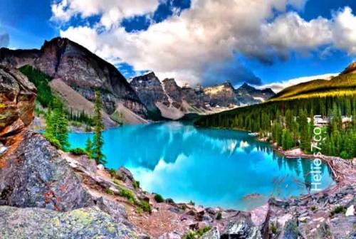 Describe this picture with using at least 5 sentences. By the way this place is named Moraine Lake