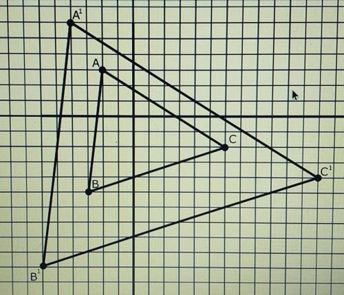 Triangle ABC has been dilated with the origin as the center of dilation. Write the algebraic repres