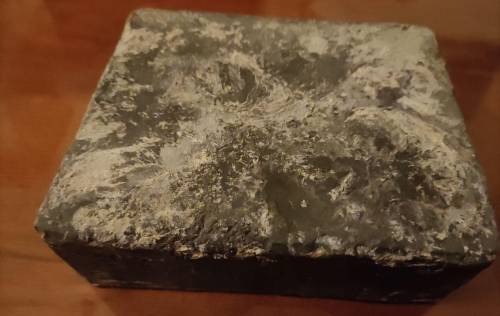 What material or metal is this: 10 cm * 12 cm * 4,25 cm. It weighs 6 kgs. It's not magnetic. I got