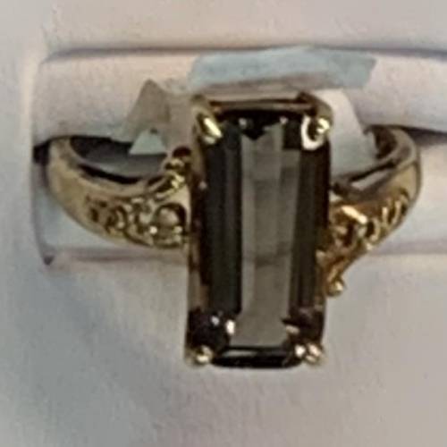I am starting to fall in love with this ring, I know it’s brown basically, but it’s a smoky topaz t