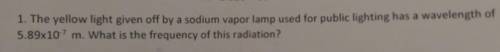 The yellow light given off by a sodium vapor lamp used for public lighting has a wavelength of 5.89